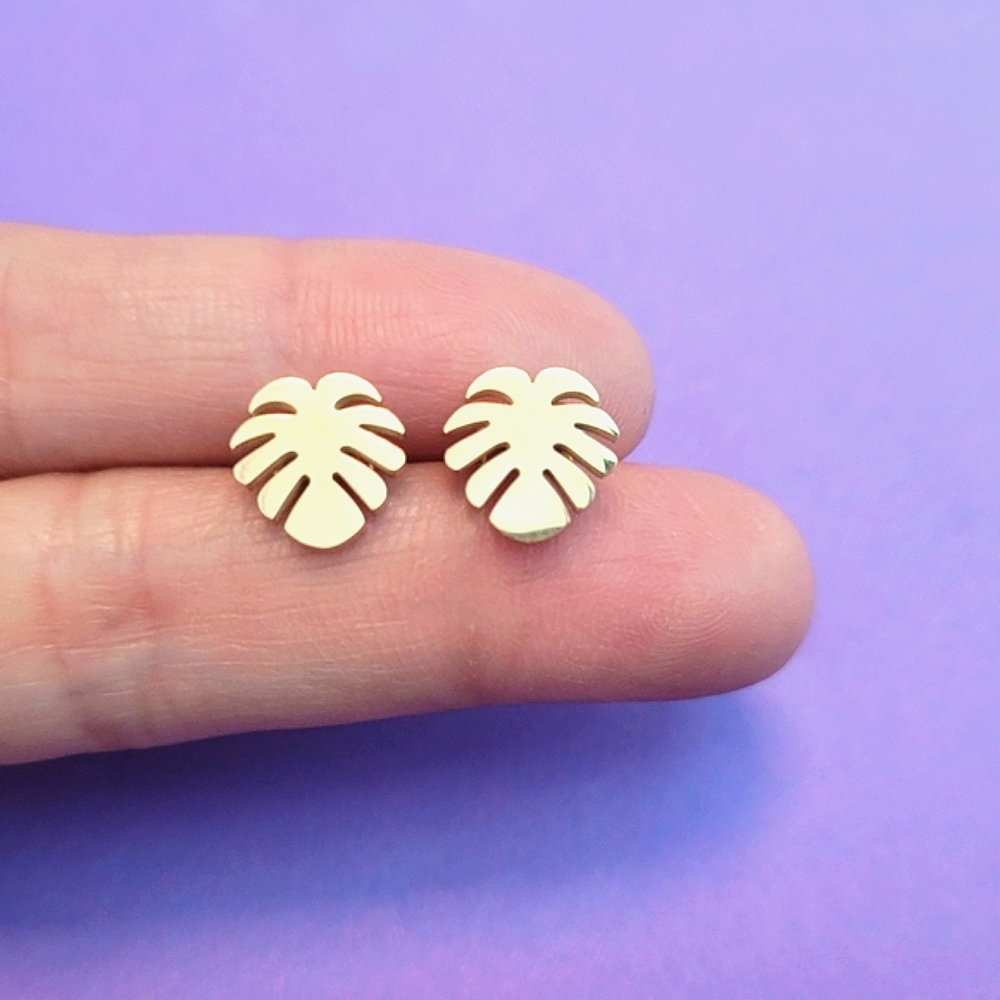 Trendy Monstera leaf shaped stainless steel earrings in rose gold color. New
